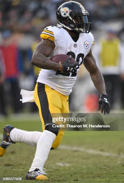 Stevan Ridley of the Pittsburgh Steelers carries the ball against the Oakland Raiders during the second half of an NFL football game at...