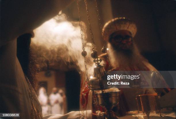 Near Bir Hooker. Coptic Monastery of St Bishoy.The scent and smoke of incense, which is an integral part of all Coptic ceremonies, fill the church of...