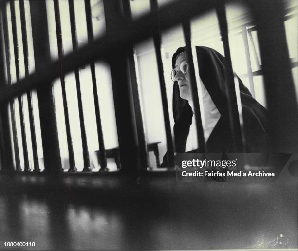 Carmelite nuns at Dulwich hill...Mother Elias, a cloistered nun behind her bars. May 03, 1983. .