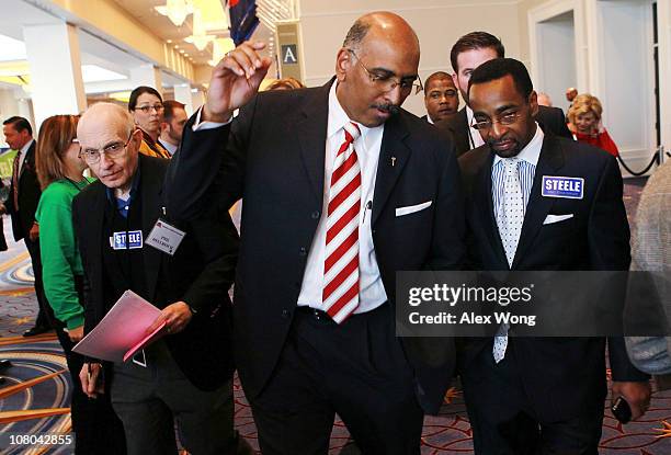 Incumbent Republican National Committee Chairman Michael Steele leaves the room after the fifth round of votes for RNC chairmanship the Republican...