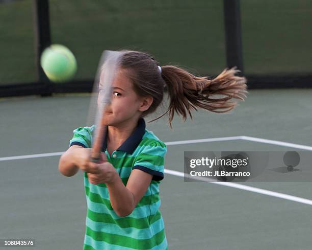 little tennis player with eye on the ball - amateur photography stock pictures, royalty-free photos & images