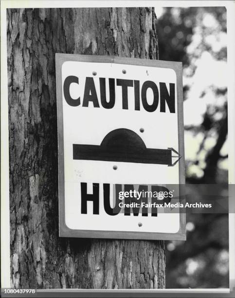 Car drives over speed control hump in Carinya Rd., Picnic Point. August 06, 1979. .