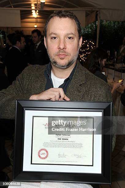 Film Editor Dylan Tichenor poses with the "Year of Excellence" award for "The Town" at the Eleventh Annual AFI Awards presentation at the Four...