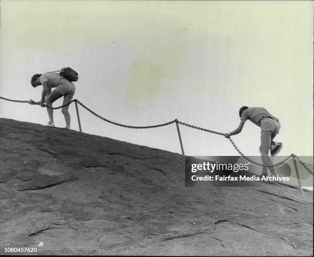 Pix at Yulara Resort, a new hotel near Ayers Rock.People descend Ayers Rock. February 16, 1984. .