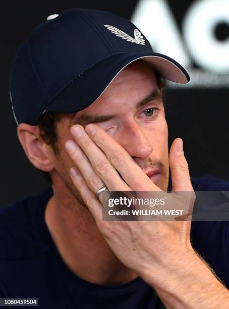 Andy Murray of Great Britain breaks down during a press conference in Melbourne on January 11 ahead of the Australian Open tennis tournament. -...