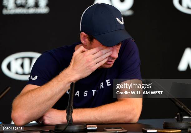 Andy Murray of Great Britain breaks down during a press conference in Melbourne on January 11 ahead of the Australian Open tennis tournament. -...