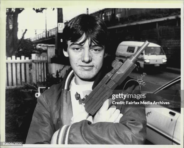 Martin Fraser 16 of Stanmore with his toy Machine Gun that squirts water.Police including The Tactical Reponce group &amp; a Helicopter converged on...