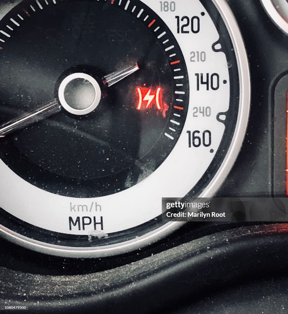 Car dashboard warning light driving with emergency brake on