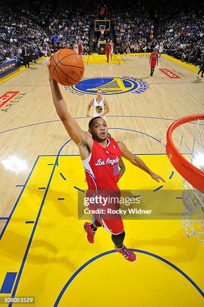 Eric Gordon of the Los Angeles Clippers soars through the air for a dunk in a game against the Golden State Warriors on January 14, 2011 at Oracle...