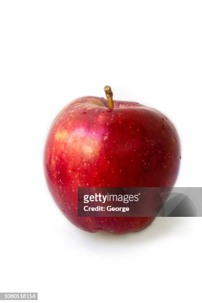 one red apples on white background - apples full frame stock pictures, royalty-free photos & images