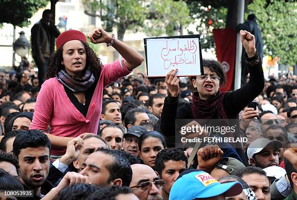 Tunisians shout slogans during a protest rally in front the Interior ministry in Habib Bourguiba avenue in Tunis after Tunisian President Zine El...