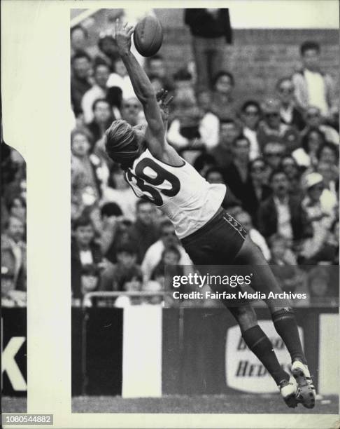 Sydney Swans full-forward Warwick Capper takes one of his few marks in the game against Fitzroy Yesterday. June 01, 1986. .
