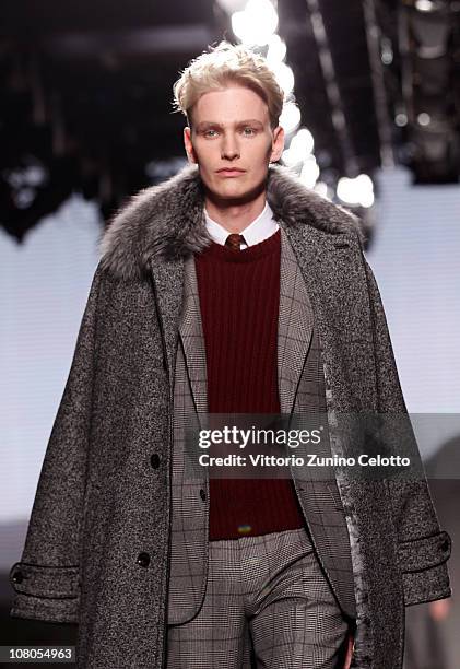 Model walks down the runway during the Ermenegildo Zegna Milan Fashion Week Menswear A/W 2011 show on January 15, 2011 in Milan, Italy.