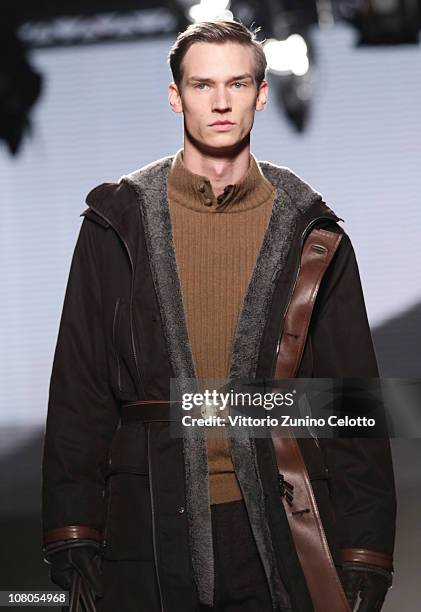 Model walks down the runway during the Ermenegildo Zegna Milan Fashion Week Menswear A/W 2011 show on January 15, 2011 in Milan, Italy.