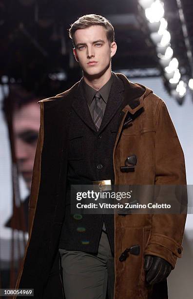 Model walks down the runway during the Ermenegildo Zegna Milan Fashion Week Menswear A/W 2011 show on January 15, 2011 in Milan, Italy.