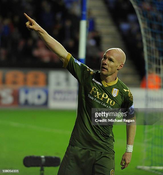 Andy Johnson of Fulham celebrates scoring to make it 1-1 during the Premier League match between Wigan Athletic and Fulham at the DW Stadium on...