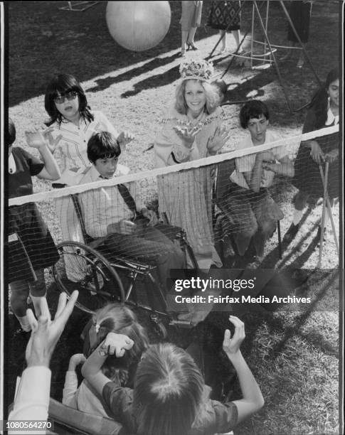 Miss Australia Gloria Krope with children from the spastic centre at Mossman.Miss Australia Gloria Krope pictured with, one of the pupils at the...