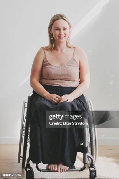 paraplegic woman in her wheelchair - paraplegic stock pictures, royalty-free photos & images