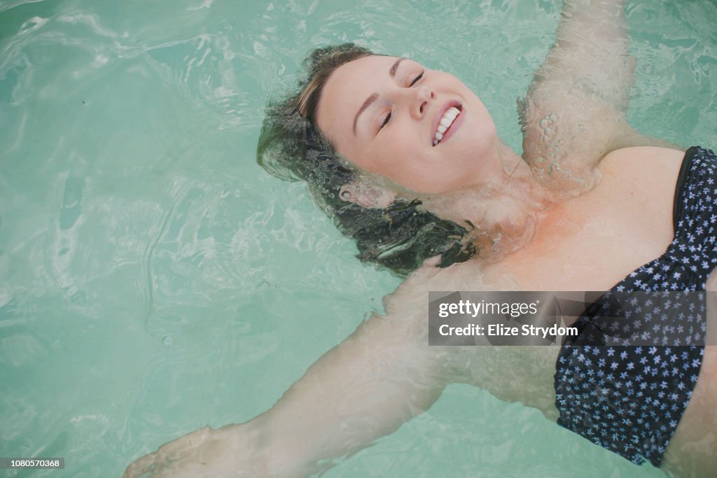 Paraplegic woman in a pool