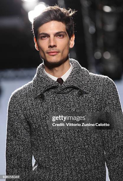 Model walks down the runway during the Ermenegildo Zegna Milan Fashion Week Menswear A/W 2011 show on January 15, 2011 in Milan, Italy.