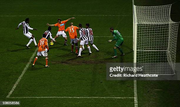 Brett Ormerod of Blackpool fluffs a shot in a goalmouth scramble during the Barclays Premier League match between West Bromwich Albion and Blackpool...