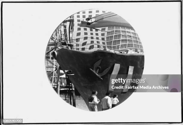 Exteriors of Australian Maritime Museum at Darling Harbour.Reflection of HMAS Vampire in a mirrored Porthole.HMAS Vampire, seen through a window of...