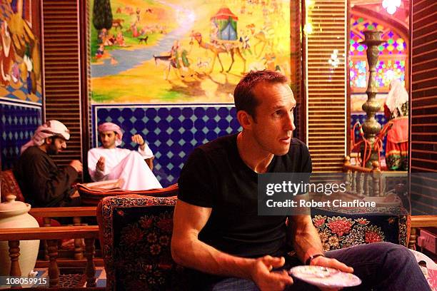 Australian goalkeeper Mark Schwarzer enjoys dinner at a local restaurant in the Souq Waqif on January 15, 2011 in Doha, Qatar. The Australian squad...