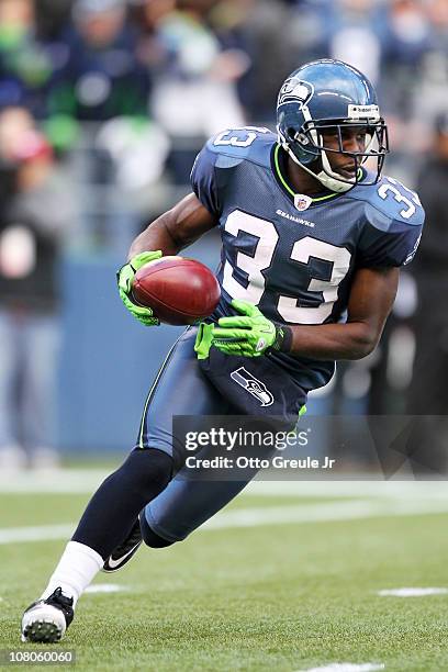 Leon Washington of the Seattle Seahawks runs down field against the New Orleans Saints during the 2011 NFC wild-card playoff game at Qwest Field on...