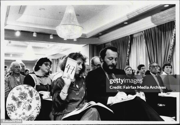 Sotheby's Art Auction at Menzies Hotel.A couple bid for a painting and win . October 24, 1985. .