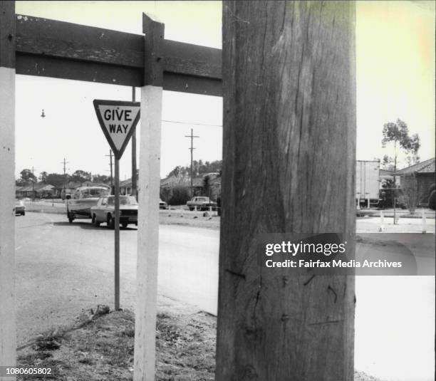 The hazardous intersection of Henry Lawson Drive and Bullecourt Avenue, Milperra.The obscured traffic signs seen from Bullecourt Ave. August 17,...
