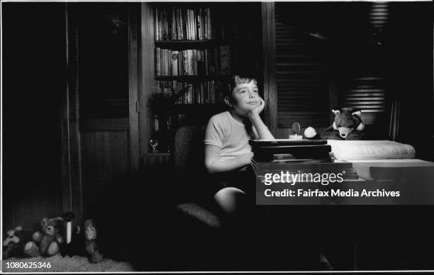Home School" -- 10 y.o. Bright kid Martin Jenkins of Beacon Hill studying in the bedroom of his home. It has been so successful that he was jumped...
