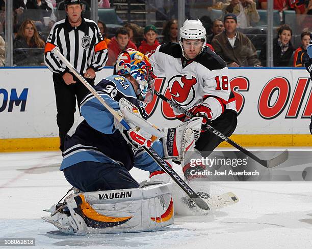 Goaltender Scott Clemmensen of the Florida Panthers stops a shot by Vladimir Zharkov of the New Jersey Devils on January 15, 2011 at the BankAtlantic...