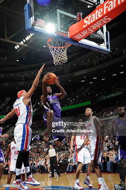 Tyreke Evans of the Sacramento Kings shoots against Charlie Villanueva of the Detroit Pistons in a game on January 15, 2011 at The Palace of Auburn...