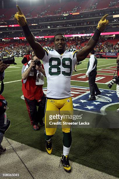 James Jones of the Green Bay Packers celebrates as he walks off the field after the Pakers won 48-21 against the Atlanta Falcons during their 2011...