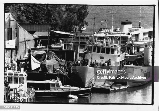 Under the tarpaulin, left, on a barge in this cramped area of Berrys Bay is where Mr. Vingens, inset, has to work.They say Sydney Harbour is a...