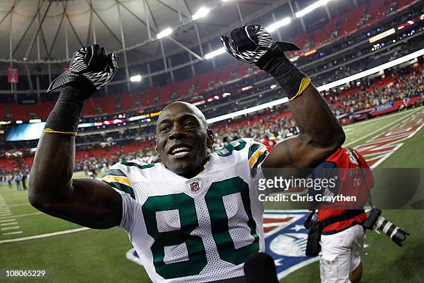 Donald Driver of the Green Bay Packers celebrates as he walks off the field after the Packers own 48-21 against the Atlanta Falcons during their 2011...
