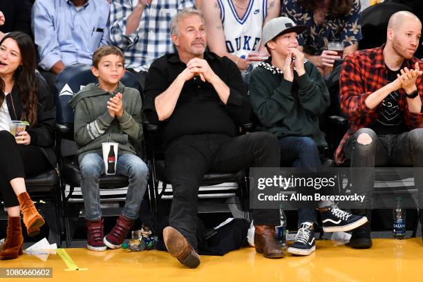 Kevin Costner, Hayes Logan Costner and Cayden Wyatt Costner attend a basketball game between the Los Angeles Lakers and the Miami Heat at Staples...
