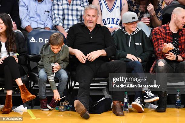 Kevin Costner, Hayes Logan Costner and Cayden Wyatt Costner attend a basketball game between the Los Angeles Lakers and the Miami Heat at Staples...