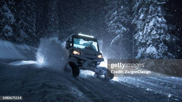 utv with tracks in powder snow - powder snow imagens e fotografias de stock