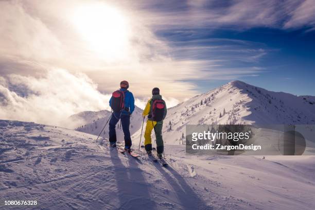 powder skiing - outdoor activities stock pictures, royalty-free photos & images