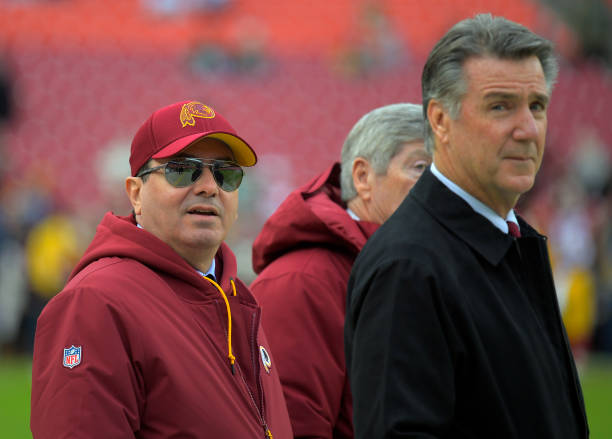 Washington Redskins owner Dan Snyder, left, with team president Bruce Allen, right, before a game between the Washington Redskins and the...