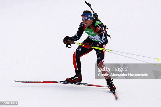 Michael Greis of Germany competes in the men's pursuit event during the e.on IBU Biathlon World Cup at Chiemgau - Arena on January 16, 2011 in...
