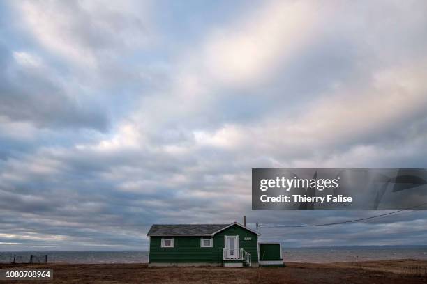 Traditional wooden Acadian house lies along the Chaleur Uplands near the Gulf of Saint Lawrence.