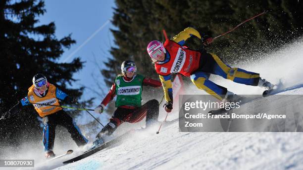 Anna Holmlund of Sweden takes 3rd place, Marion Josserand of France takes 4th place, Ashleigh McIvor of Canada ,during the FIS Freestyle World Cup...