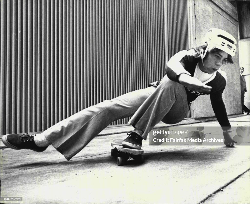 15 year old Andrian Batho, of Manly Vale, who was overall winner junior events of the Winter Skateboard Olympics at North Rocks, does a power slide during the demonstrations.A demonstration to demonstrate the tricks and safe skating methods adopted by the