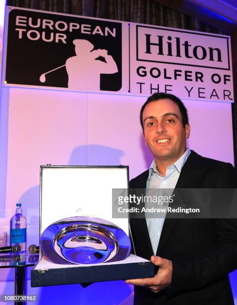 Francesco Molinari of Italy poses with the trophy as he is announced as the 2018 Hilton European Tour Golfer of the Year on December 10, 2018 at the...