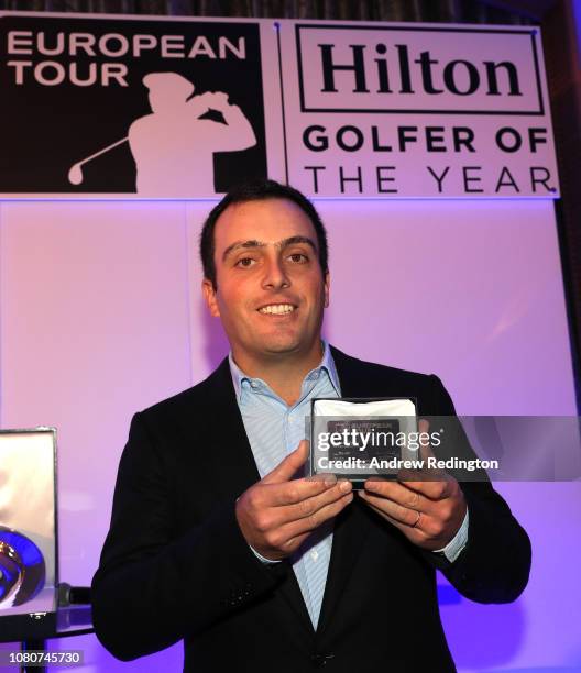 Francesco Molinari of Italy poses with the membership card as he is awarded honorary life membership of the European Tour at the European Tour Golfer...