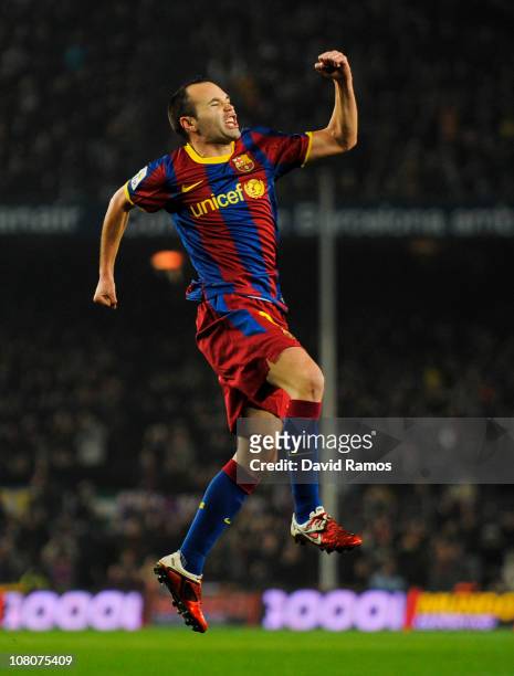 Andres Iniesta of FC Barcelona celebrates after scoring his side's first goal during the La Liga match between FC Barcelona and Malaga at Nou Camp on...