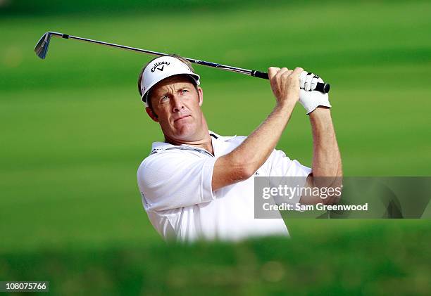 Stuart Appleby of Australia plays a shot on the 13th hole during the third round of the Sony Open at Waialae Country Club on January 16, 2011 in...