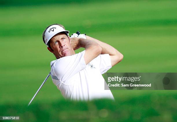 Stuart Appleby of Australia plays a shot on the 13th hole during the third round of the Sony Open at Waialae Country Club on January 16, 2011 in...